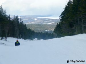 Sliding down Saddleback Mountain